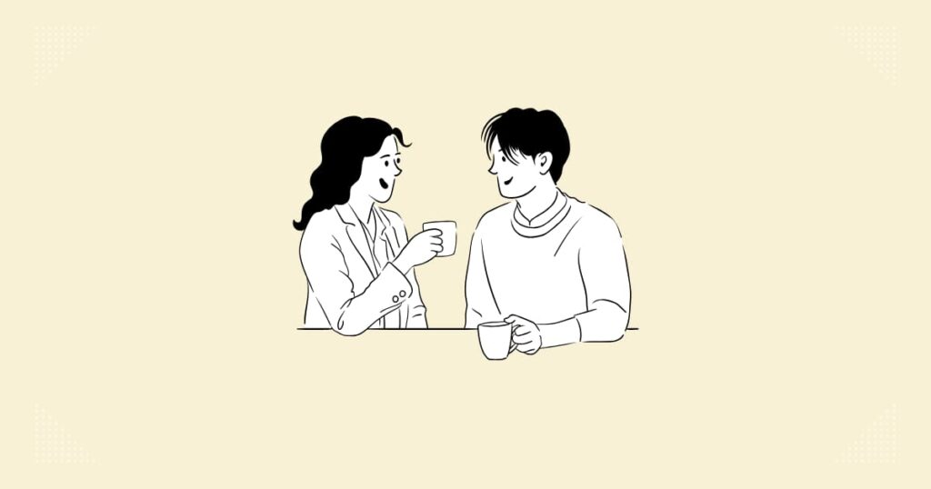 若い男女がコーヒーを飲みながら話している